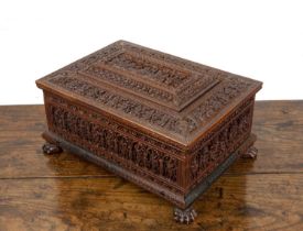Sandalwood jewel box Indian, late 19th/20th Century, with extensive carved decoration throughout and