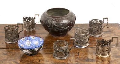 Group of pieces including six Russian filigree white metal glass holders, a Persian enamel bowl,