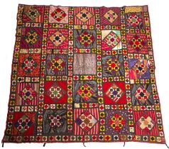 Sampler bed cover Uzbekistan, made from scraps of old silk chapans, mostly pre-1900, 24cm x 226 cm