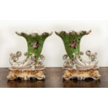 Pair of Jacob Petit porcelain cornucopia vases decorated with flowers and gilt highlights on an