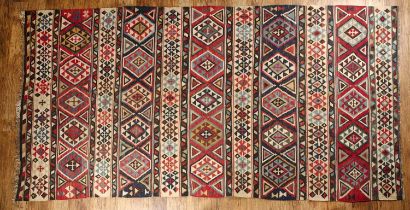 Large Kelim sofa carpet with multi coloured traditional geometric designs, 347cm x 170cm approx Some