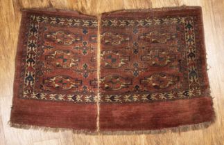 Tekke rug in two parts, 78cm x 120cm, an Indian Amritsar rug fragment 152cm x 89cm, and a