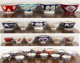 Group of porcelain bowls and tea bowls and a teapot Russian, with lustre and painted designs,