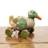 Steiff 'Pull along' duck (1917-1932), wool and felt on painted wooden wheels, previously would