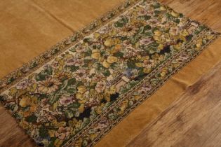 Golden brown rug with floral banner the floral banner with castle architecture and trees, 285cm long