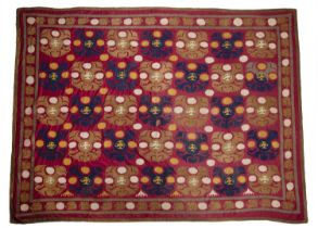 Large red ground suzani Uzbekistan, circa 1940, woven with coffee pots and carnations, 285cm x 228cm