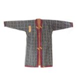 Blue ground printed coat Turkmen, with stylised leaf designs, and fitted striped lining. Provenance: