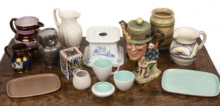 Group of pieces to include six Poole Pottery pieces, all with stamps to the base, including a grey/