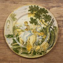Castelli maiolica dish Italian, with horses and figures in an Italianate landscape, 26cm Some