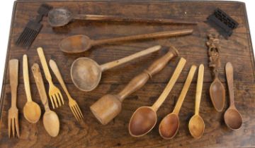 Group of treen and wooden ladles Indian combs and other pieces Provenance: The Olivia Dell