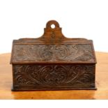 Oak candle box 19th Century, treen with carved foliate designs, 36cm x 26.5cm high x 16cm deep