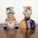 Pair of figural Staffordshire spill vases late 19th Century, unmarked, 13cm high overall (2)
