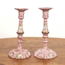Pair of Bilston pink enamel candlesticks English, circa 1780, painted with flower and bird panels,