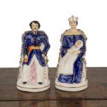 Pair of Staffordshire figures depicting Queen Victoria and Prince Albert, unmarked, holes to the