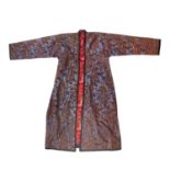 Cinnamon and blue damask silk chapan Uzbekistan, with a Russian red and floral print lining.