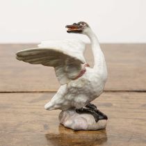 Porcelain model of a swan Meissen, with blue crossed swords mark, 10cm high With some old