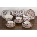 Possibly Newhall silvered tea set with handpainted patterned flowers, to include three cups, seven