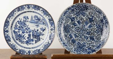 Two blue and white porcelain chargers Chinese, 18th/19th Century one painted with a Willow scene,