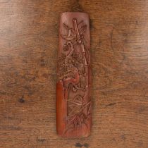 Bamboo wrist rest Chinese, late 19th/early 20th Century carved with bamboo and blossom, 6cm x 24.3cm