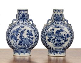 Pair of small blue and white moonflasks Chinese, 19th Century each painted with birds, rockwork