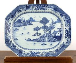 Octagonal blue and white porcelain charger Chinese, circa 1800 painted with a river landscape scene,