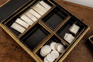 Export lacquer games box and a large quantity of mother of pearl gaming counters Chinese, 19th