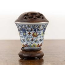 Doucai porcelain tea bowl Chinese painted with Buddhistic symbols, lotus flowers and a ruyi