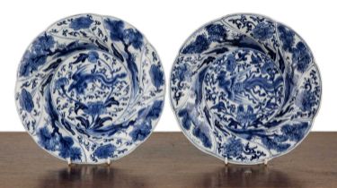 Pair of blue and white shallow bowls Chinese, Kangxi period (1662-1722) painted with phoenixes and