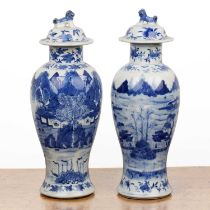 Pair of blue and white vases and covers Chinese, 19th Century painted with river landscape scenes,