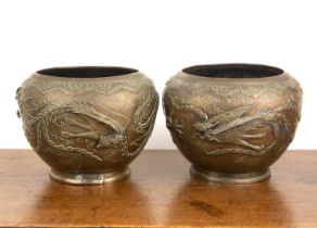 Pair of bronze jardinieres Chinese, circa 1900 with raised raised phoenixes and clouds, each