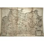 An 18th century atlas containing fifty three maps, mostly hand-coloured and mounted in an 18th