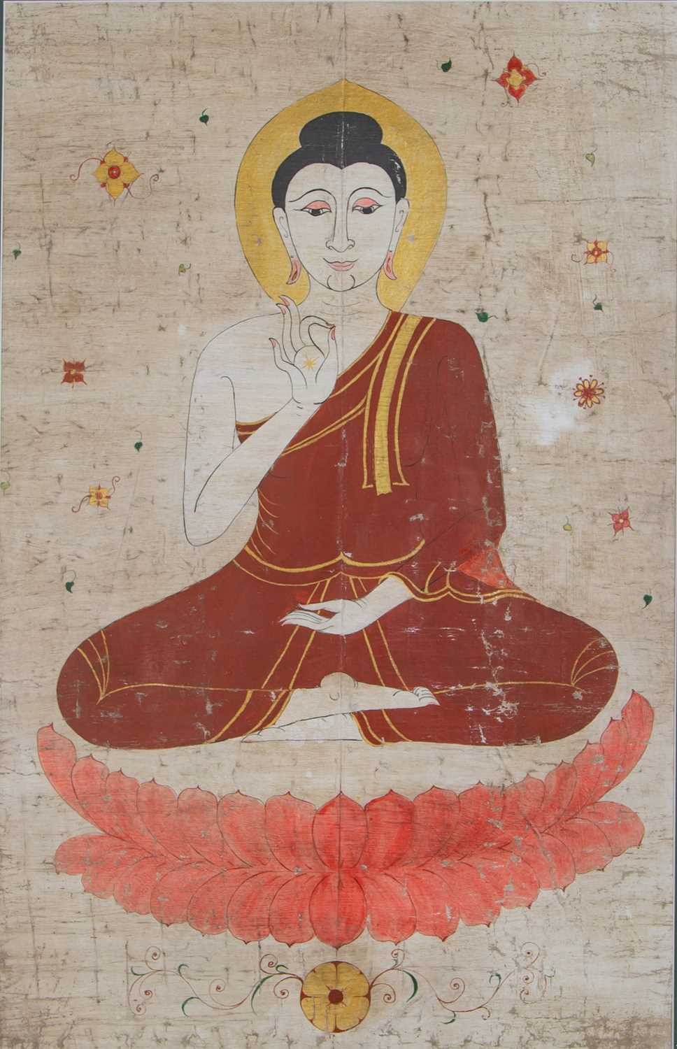 A Tibetan Thangka, painted with a Bodhisattva upon a lotus leaf, 84 x 54cm