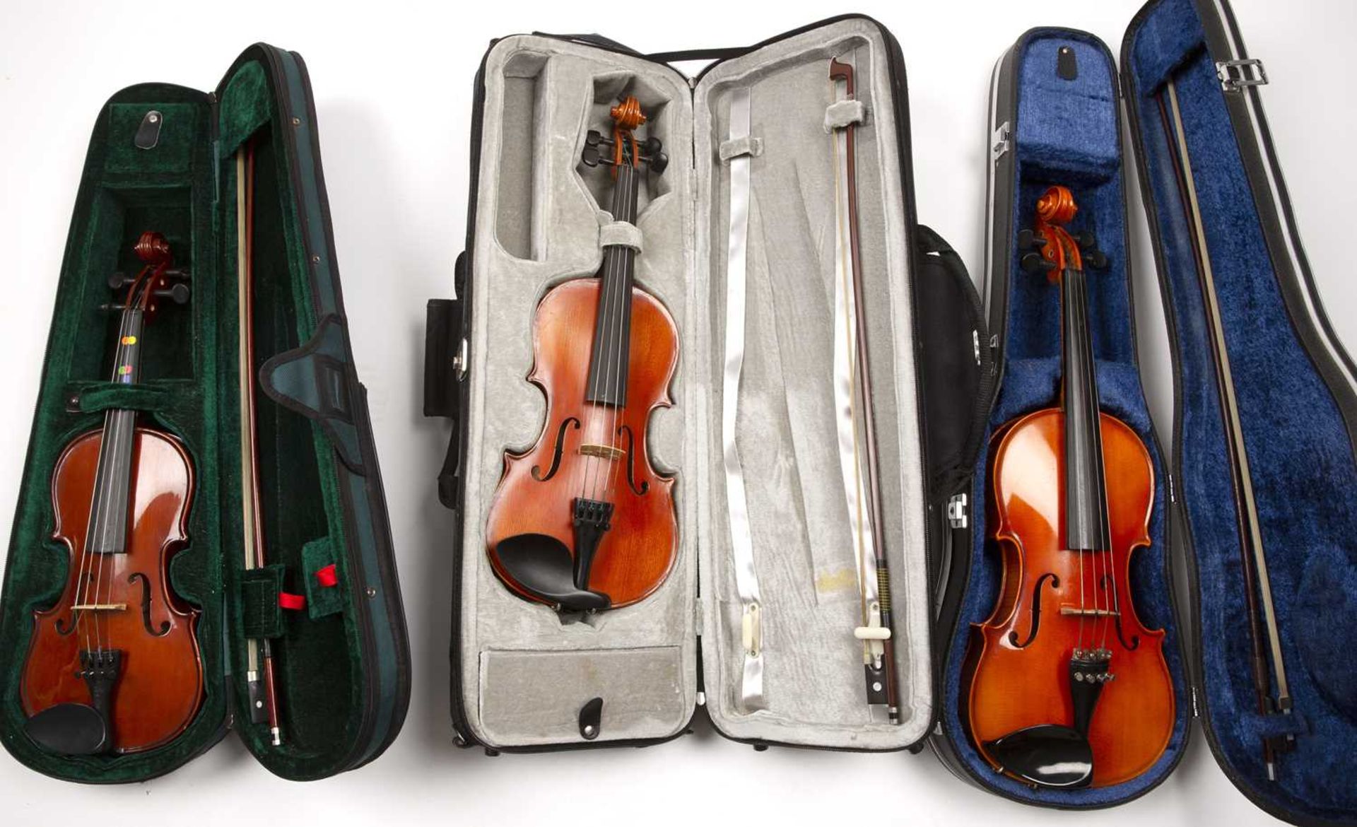 A collection of six modern violins, various makes, some with bows, all cased; together with a - Image 3 of 5