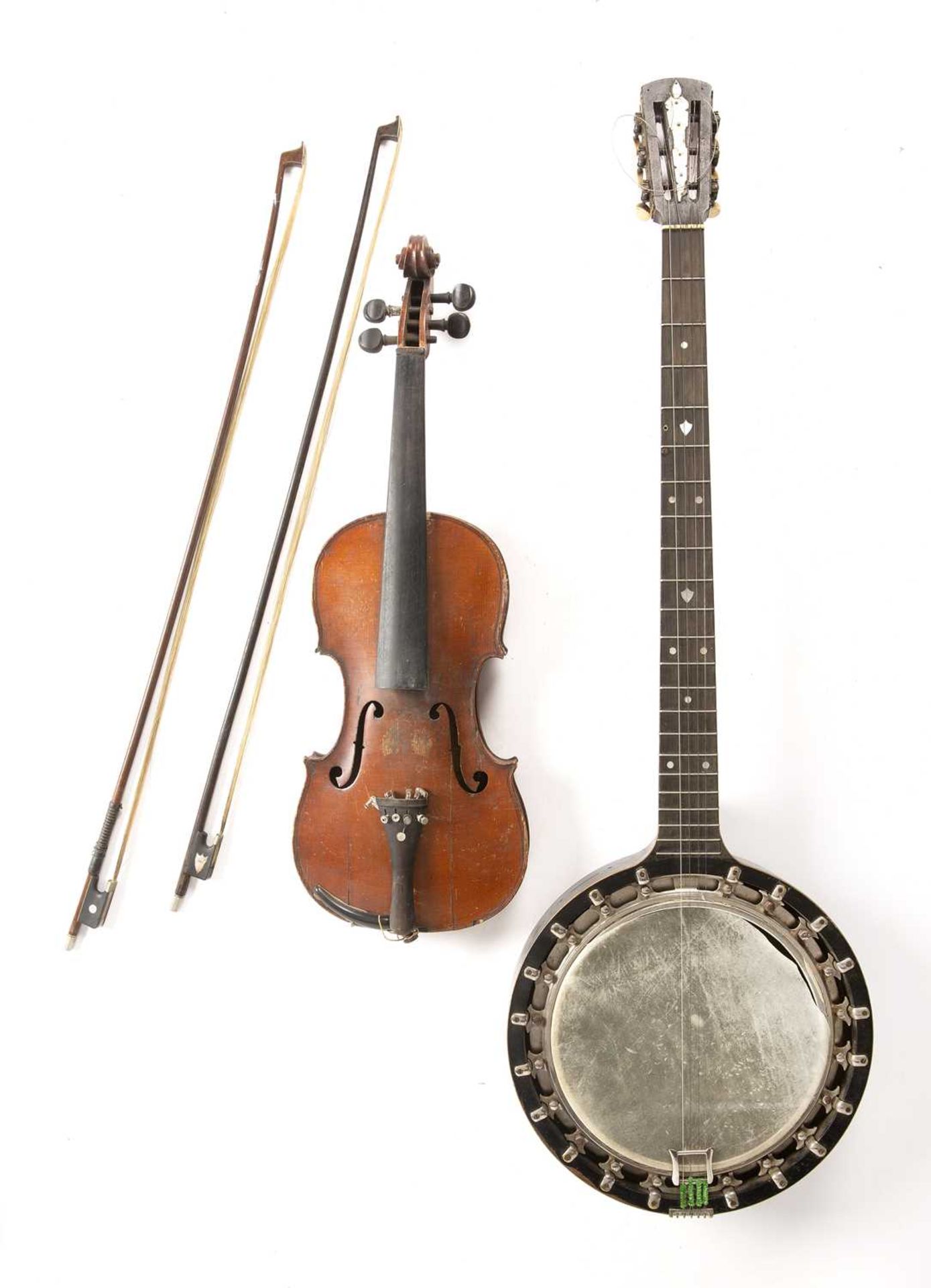 An early 20th century mahogany and ebonised zither banjo with bone mount and tuning pegs, foliate