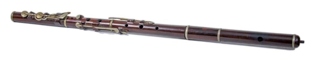 An early 20th century Cocus wood flute by Metzler and co, London, 66cm in length