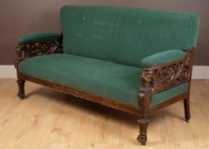 A late Victorian mahogany country house or billiard room sofa