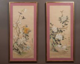 A pair of Chinese silkwork pictures depicting birds amongst flowering branches, of framed scroll