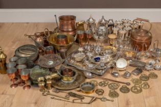 A large collection of plated silverware together with a large collection of copper and brass wares