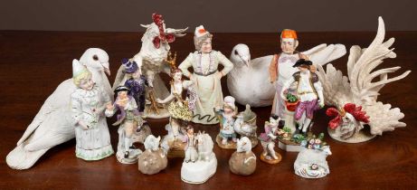 A collection of porcelain figurines and other pottery