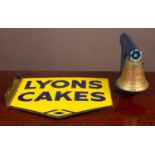 'Golden Bitter' bell and a 'Lyons Cakes' sign