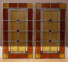 A pair of stained glass panels