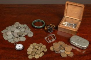 A small silver pocket watch