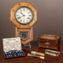 Five items including A drop dial clock by Ansonia, a tea caddy, silver teaspoons, an ear syringe and