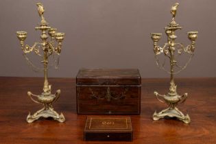 A pair of gilt metal three branch candelabra