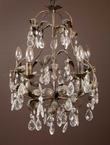 A pair of modern gilt pressed metal chandeliers