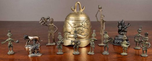 A collection of small bronze and bronzed statuettes