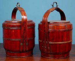 A pair of red lacquered bamboo stacking canteens
