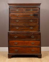 A 20th century stained wood chest on chest