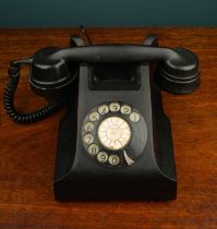 Black Bakelite rotary dial telephone