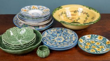 A collection of European pottery serving bowls and dishes